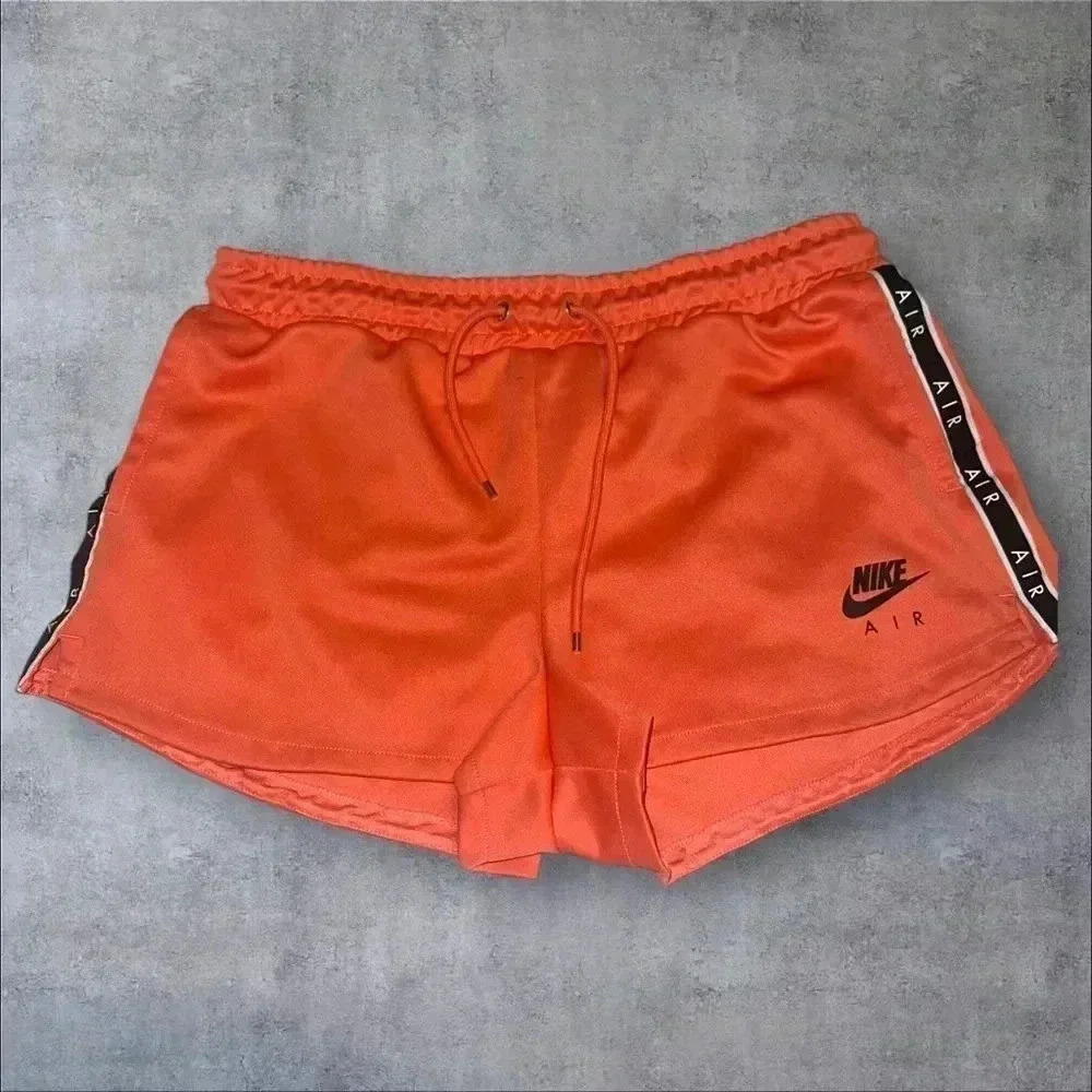 Orange Nike air shorts size large